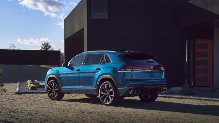 The 2024 Volkswagen Atlas Cross Sport seen from a rear quarter angle
