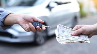 Exchanging funds in a car sale.
