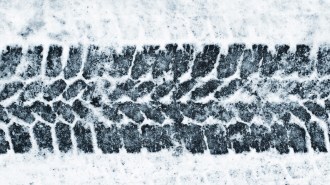 Winter tire tread on snowy surface
