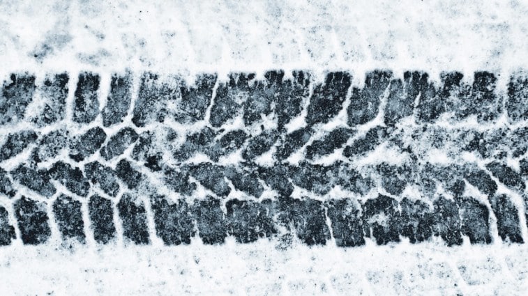 Winter tire tread on snowy surface