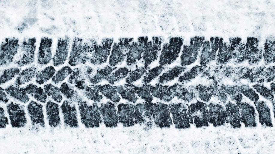 Winter tire tread on snowy surface