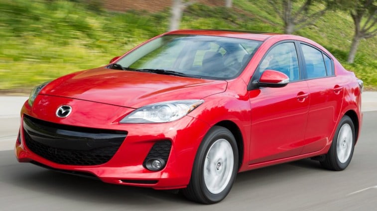 2013 Mazda Mazda3 in red.