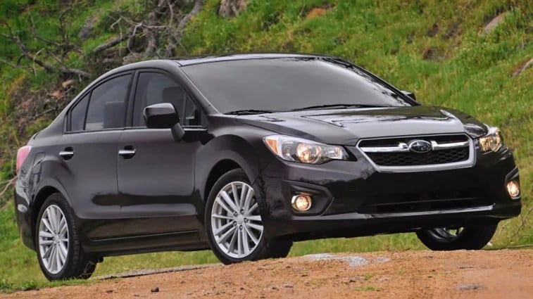 2014 Subaru Impreza in black.