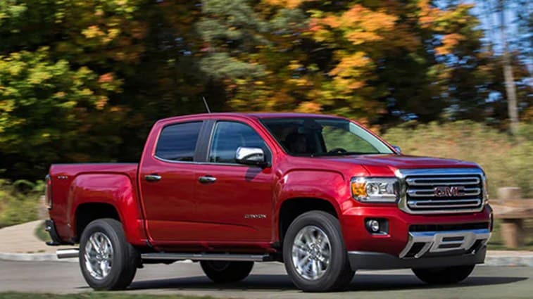 2015 GMC Canyon in red.