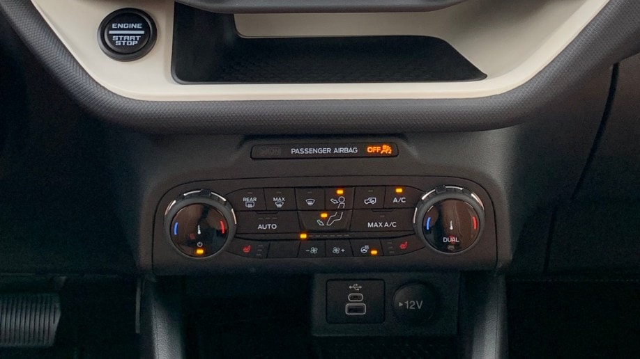 2023 Ford Bronco Sport Heritage Edition climate controls and storage cubby.
