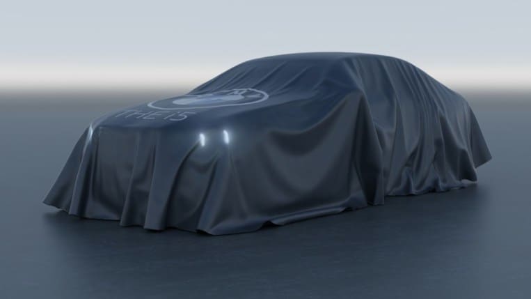 A teaser photo of the 2024 BMW 5 Series under a sheet