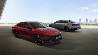 Two 2024 Hyundai Sonata sedans parked to show the car from front and rear angles