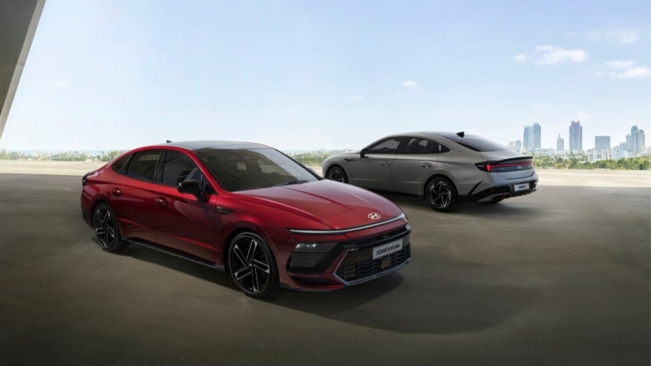 Two 2024 Hyundai Sonata sedans parked to show the car from front and rear angles