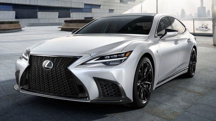 2024 Lexus LS in white near a building.