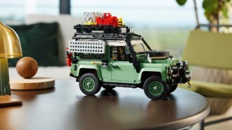 Classic Land Rover Defender 90 Lego set on a table.