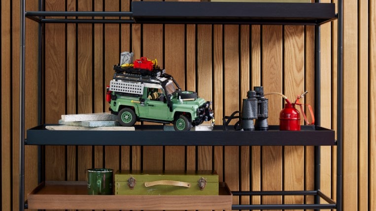 Classic Land Rover Defender 90 Lego set on a middle shelf.