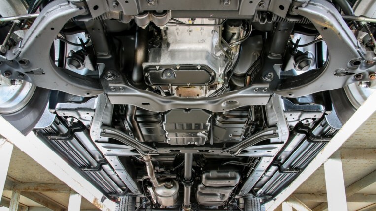A car frame underneath a vehicle