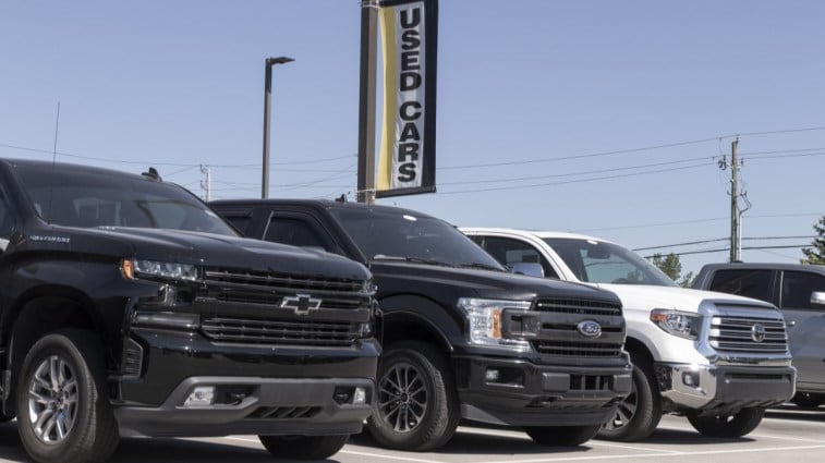 used trucks lined up at a dealership