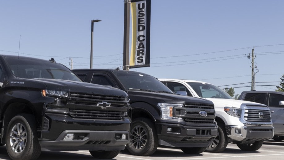 used trucks lined up at a dealership