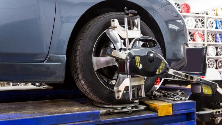 Tire alignment on a car.