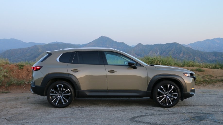 2023 Mazda CX-50 with mountains in the background.
