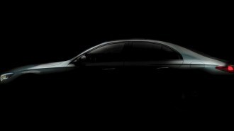 A teaser photo showing the profile of the 2024 Mercedes-Benz E-Class