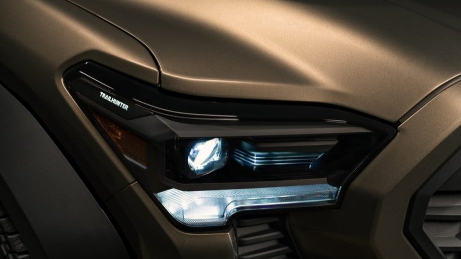 A teaser photo showing a headlight of the upcoming Toyota Tacoma Trailhunter