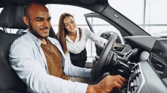 Car shopper preparing for test drive