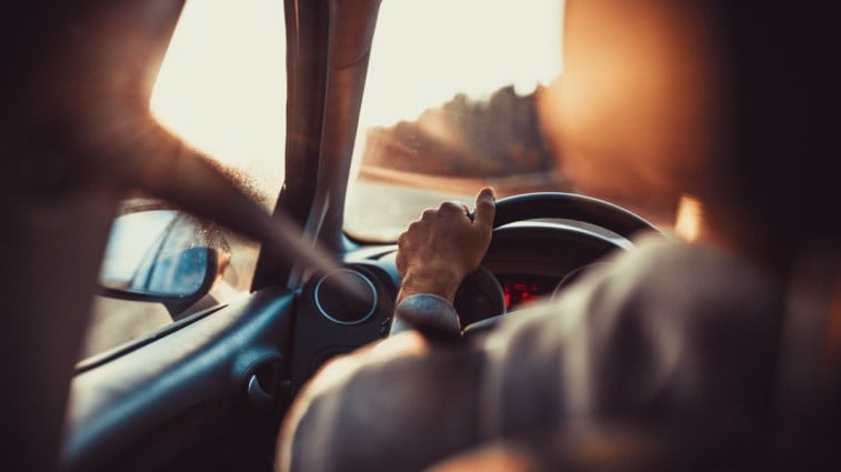 A person test driving car