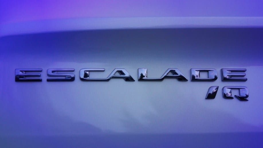 A teaser photo showing the badge of the upcoming Cadillac Escalade IQ