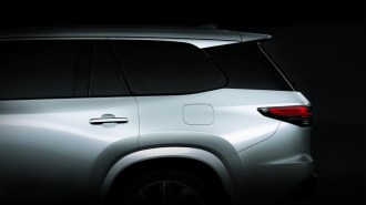 A teaser photo showing the rear window of the 2024 Lexus TX