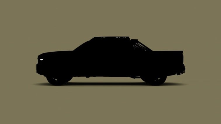 A silhouette teasing the 2024 Toyota Tacoma