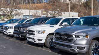 Ram trucks lined up in a dealership lot