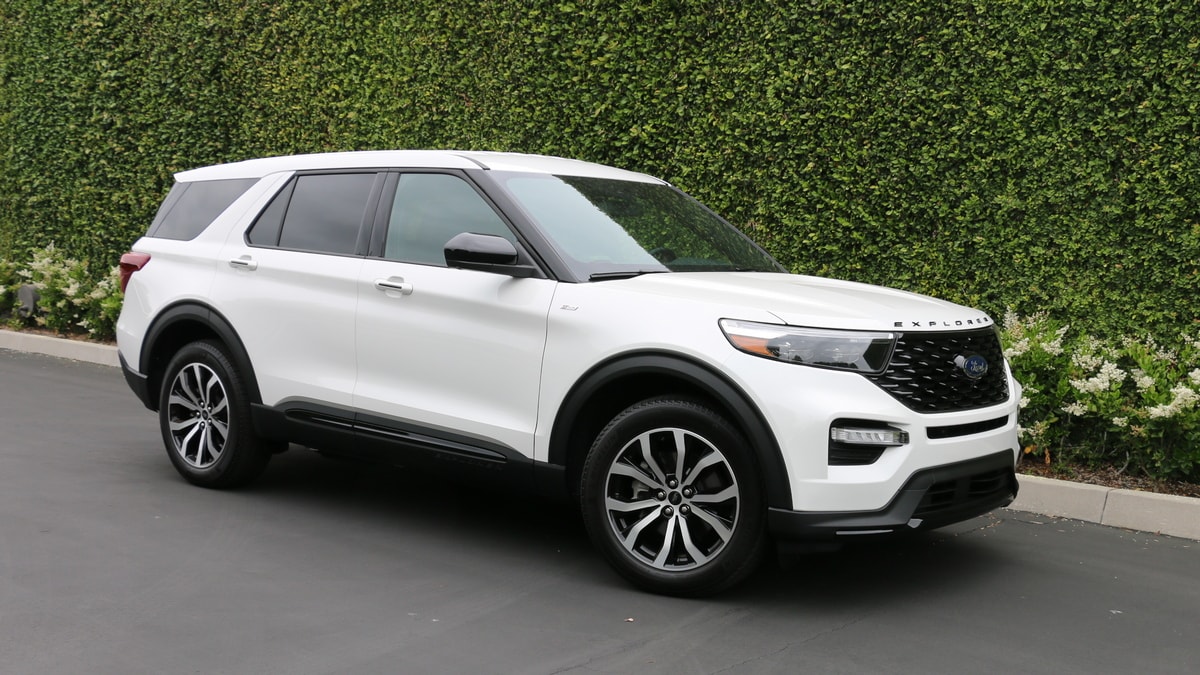 2022 Ford Explorer ST Line in white near green wall.