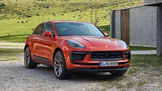 2023 Porsche Macan in orange.