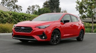 Red 2024 Subaru Impreza RS hatchback