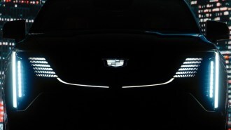 A teaser photo showing the grille of the upcoming 2024 Cadillac Escalade