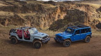 A pair of redesigned 2024 Jeep Wranglers showing roof options