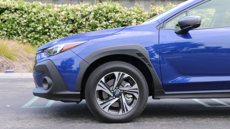 2024 Subaru Crosstrek in blue front wheel.