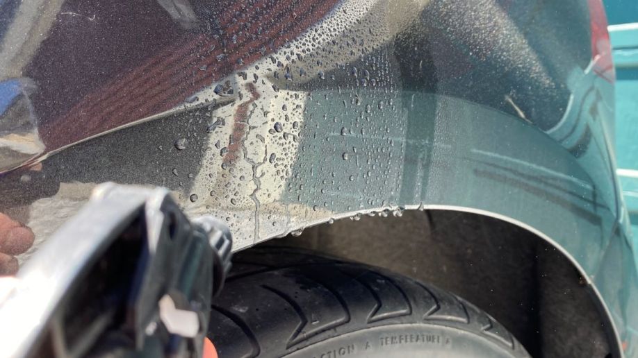 Rubbing Alcohol Sprayed on Car Paint
