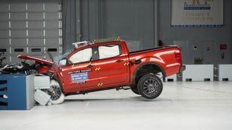 IIHS crash tests midsize trucks to test rear-seat safety in June 2023.
