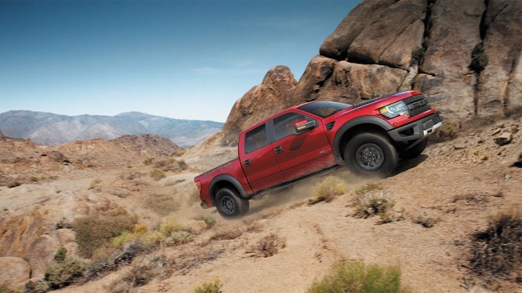 2014 Ford F-150 Raptor in red.