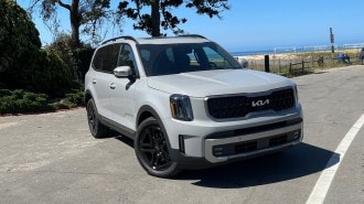 2023 Kia Telluride X-Line in gray near volley ball courts.