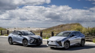 Two 2023 Lexus RZ450e SUVs parked side by side