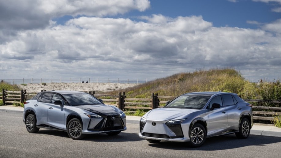 Two 2023 Lexus RZ450e SUVs parked side by side