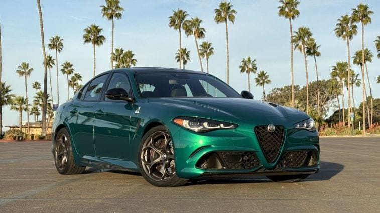 Front view of a 2024 Alfa Romeo Giulia Quadrifoglio wearing Verde Montreal paint