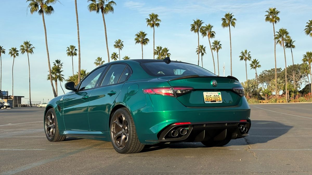 Rear view of a 2024 Alfa Romeo Giulia Quadrifoglio wearing Verde Montreal paint