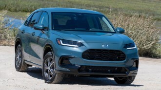 2024 Honda HR-V in blue near a marsh.