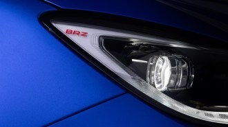 A teaser photo showing a headlight of the promised "sharper and more focused" BRZ variant