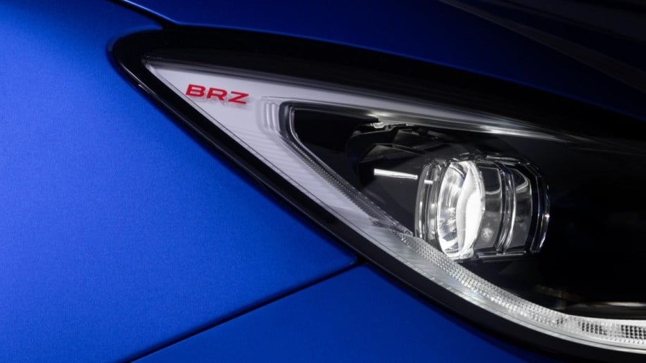 A teaser photo showing a headlight of the promised "sharper and more focused" BRZ variant