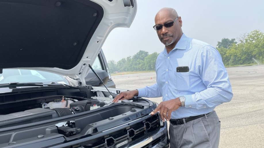 The GM Defense Heavy Duty SUV with all its armored doors open