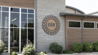 The United Auto Workers union logo on an office building