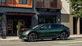 The 2023 Kia EV6 North American Utility Vehicle of the Year Edition seen in profile
