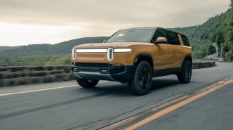 2023 Rivian R1S in yellow.