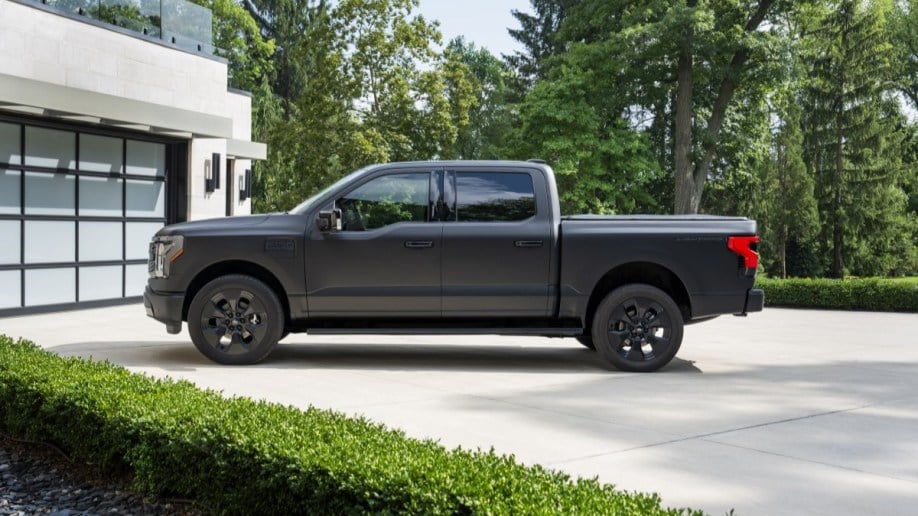 The 2024 Ford F-150 Lightning Platinum Black edition seen in profile